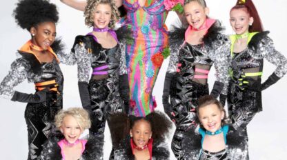 A group of dancers posing for a photo.
